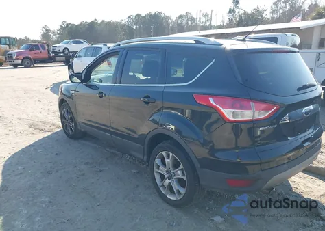 2014 Ford Escape Titanium z USA, uszkodzony, nr VIN 1FMCU9J9XEUD60083